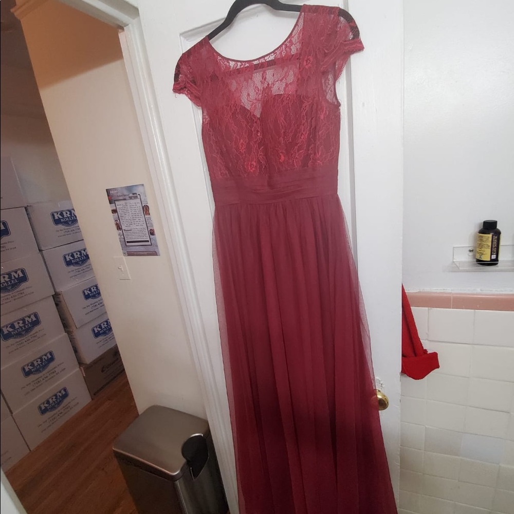 Beautiful Burgundy gown, never worn.